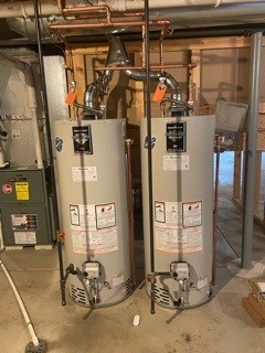 After - Twin 50 gallon installation w/thermostatic tank booster