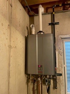 After – Unnecessary 4” vent configuration on older tankless. Installed new Rinnai RUR 199IN